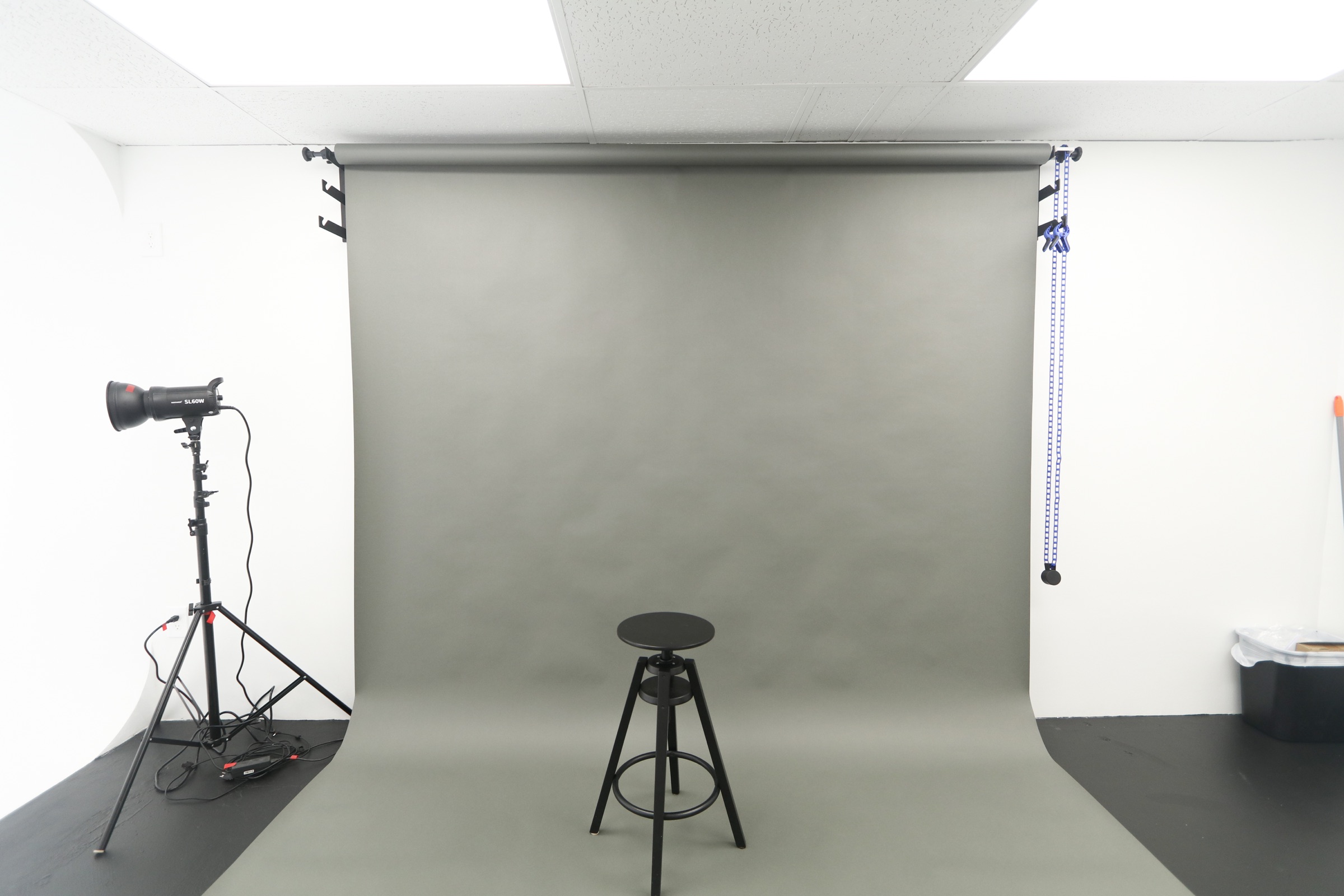 Grey seamless backdrop and studio stool